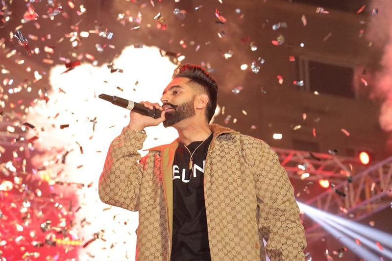 A performer in confetti at KRMU's annual fest